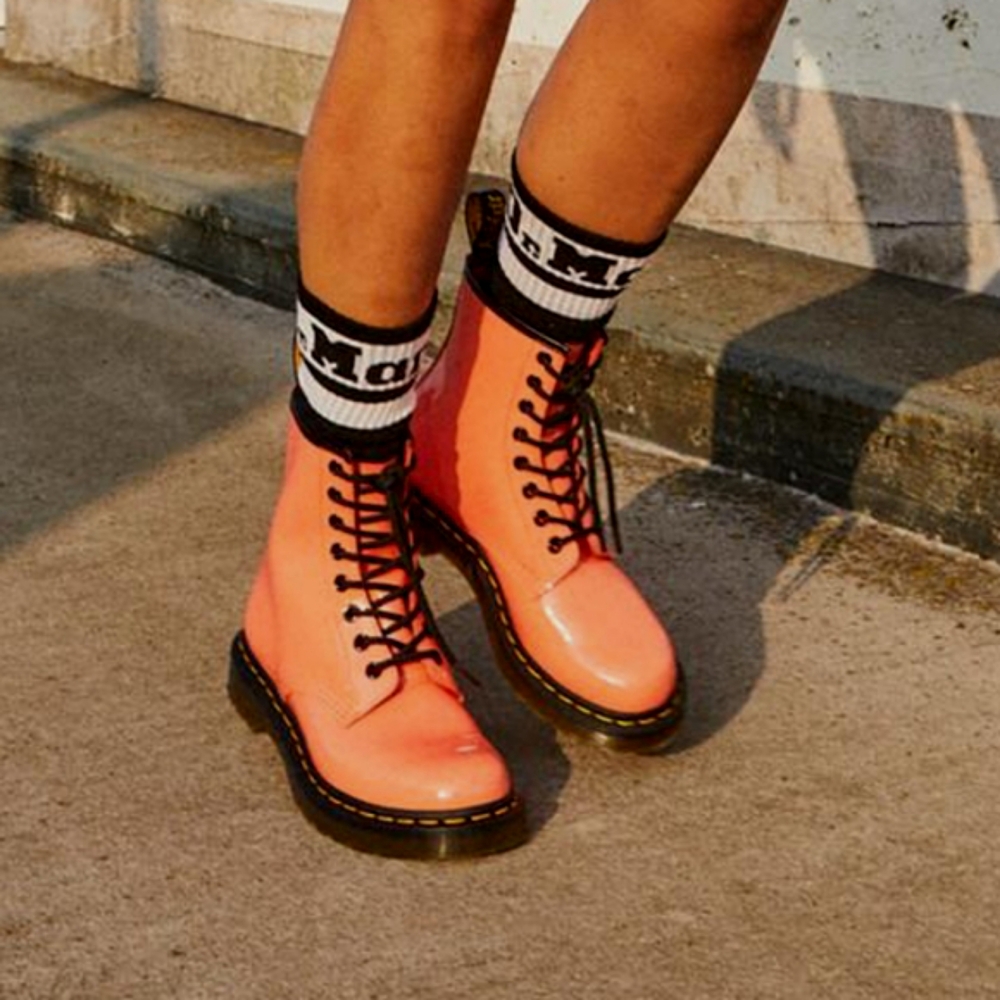 Dr. Martens 1460 women's patent leather lace up boots.